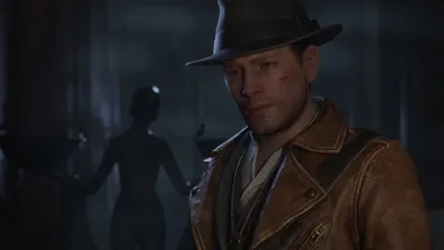 Official The Sinking City 2 screenshot of the detective in a fedora and leather jacket in a dim room, a ghostly figure behind him